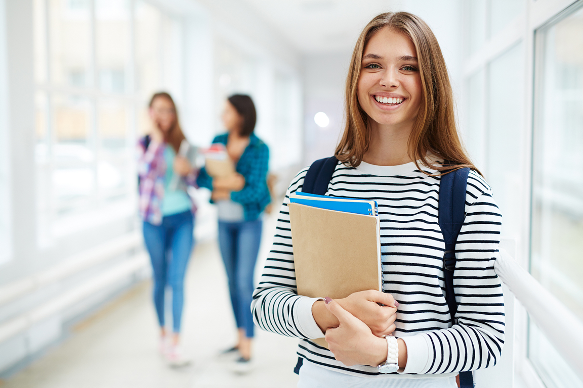 Students in a college hallway.